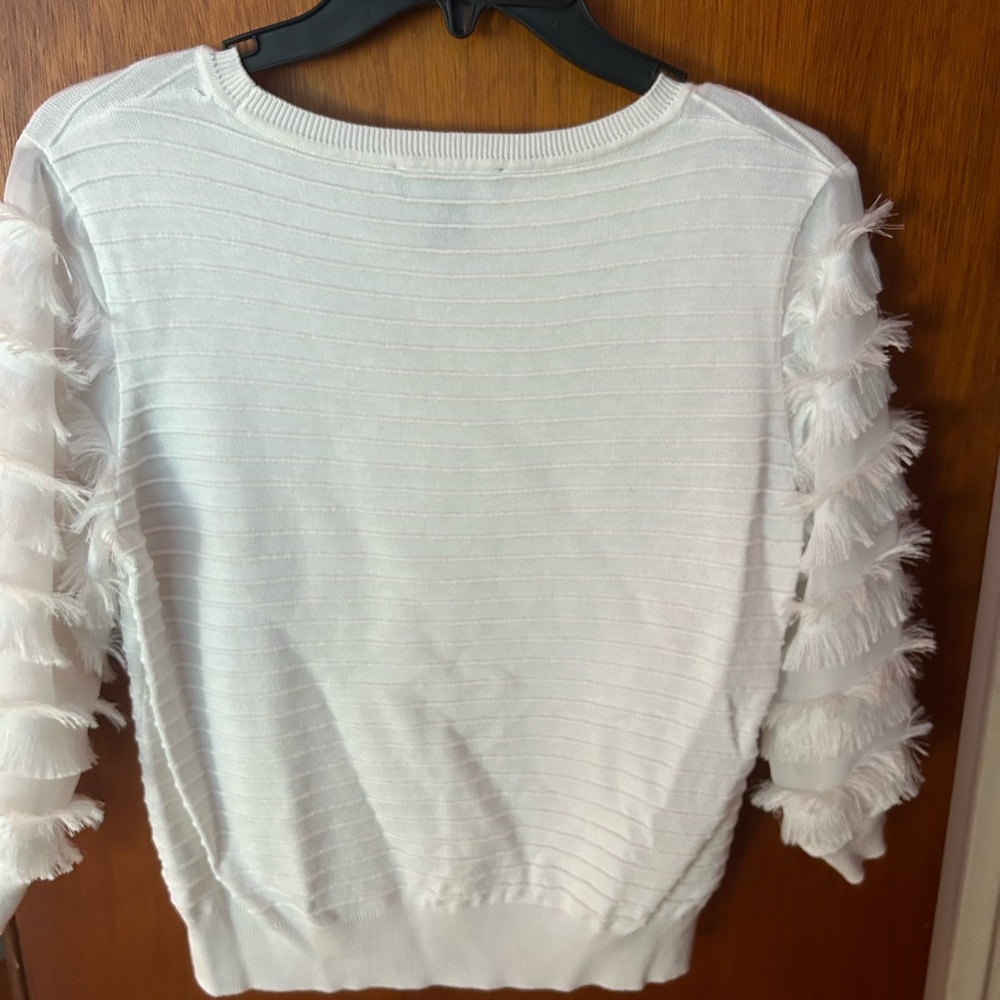 Cute white blouse with ruffle sleeves, only worn once, soft